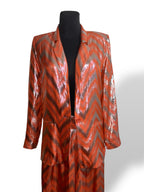 Traje de Adriana Iglesias de seda naranja y lurex