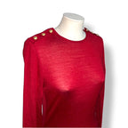 Top Balmain rojo con botones dorados en hombros estilo militar