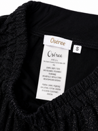 Conjunto deportivo Oséree Lumière de lúrex negro – Talla S