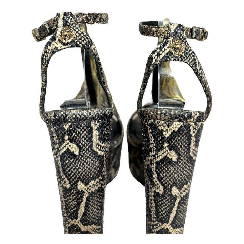 Sandalias de Cuña Roberto Cavalli en Piel de Serpiente y Borlas Doradas de Lujo