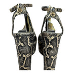 Sandalias de Cuña Roberto Cavalli en Piel de Serpiente y Borlas Doradas de Lujo