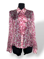 Blusa Valentino de seda con estampado floral rosa y volantes