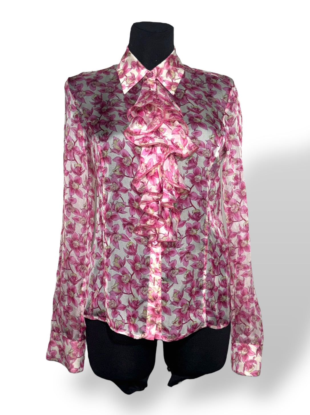 Blusa Valentino de seda con estampado floral rosa y volantes
