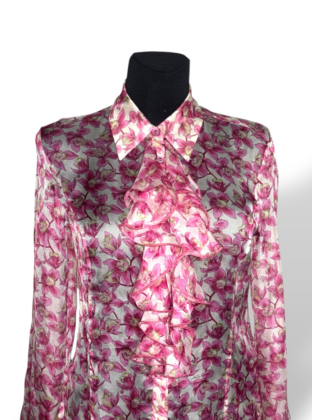 Blusa Valentino de seda con estampado floral rosa y volantes