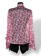 Blusa Valentino de seda con estampado floral rosa y volantes