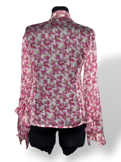 Blusa Valentino de seda con estampado floral rosa y volantes