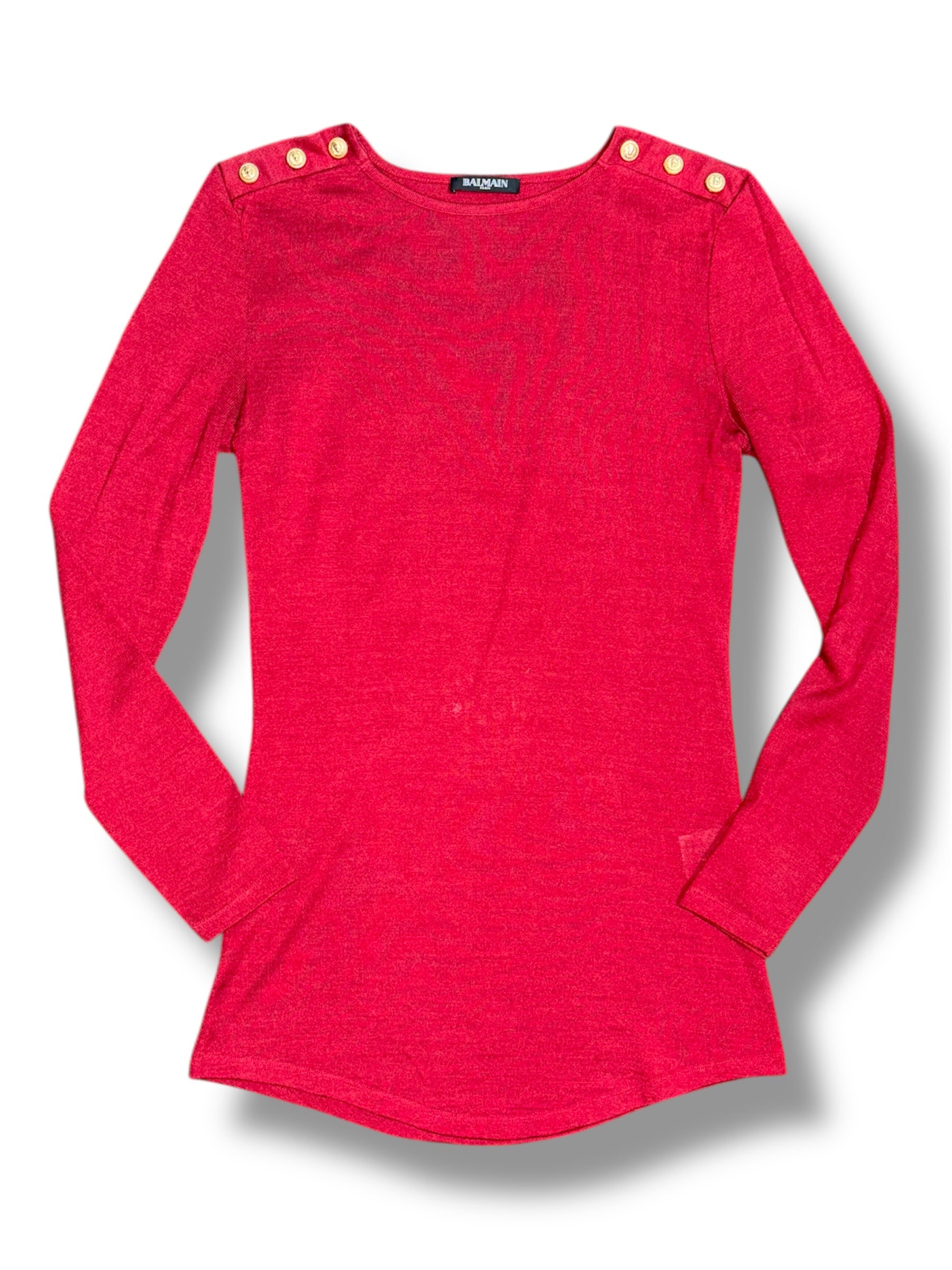 Top Balmain rojo con botones dorados en hombros estilo militar