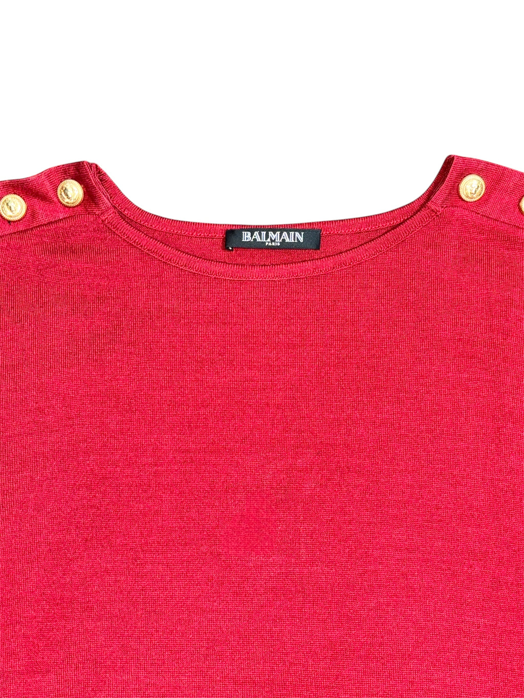 Top Balmain rojo con botones dorados en hombros estilo militar