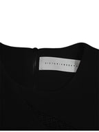 Vestido ajustado y estructurado de Victoria Beckham con paneles de malla