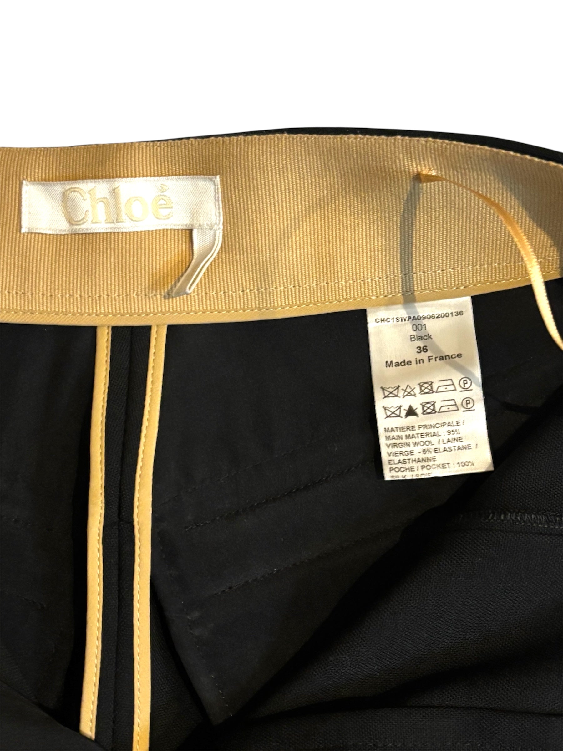 Pantalón Chloé negro de tiro alto con pernera flare y cremalleras