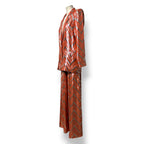 Traje de Adriana Iglesias de seda naranja y lurex