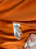 Traje de Adriana Iglesias de seda naranja y lurex