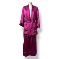 Conjunto de Adriana Iglesias de seda fucsia