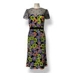 Vestido de Fiesta Moschino en Seda Floral con Escote Ilusión y Estrellas